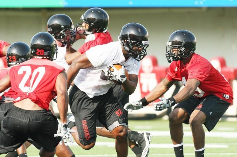 New NIU running back Cameron Bell (center) has been impressive during practices.