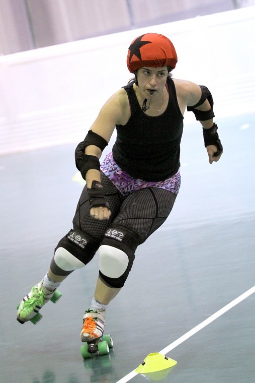 Rockford Rage Roller Derby member Melissa May Q. Hurt Bland participates in an informational event hosted Saturday at the Chick Evans Field House.