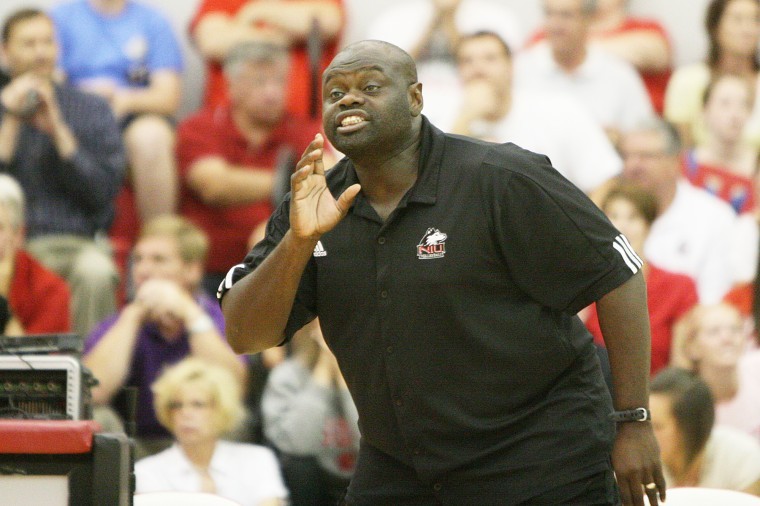 NIU head volleyball coach Ray Gooden gives his team advice during a match in 2010.