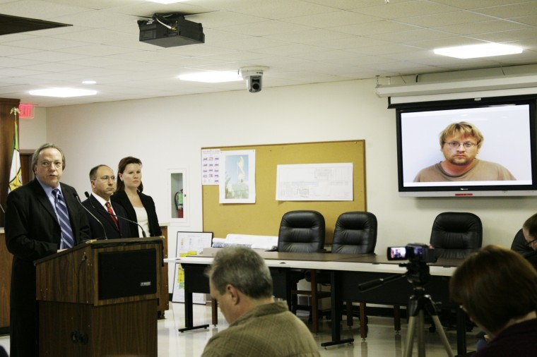 DeKalb County States Attorney John Farrell informs the public of the charges against William Billy Curl on Friday night at the press conference. 