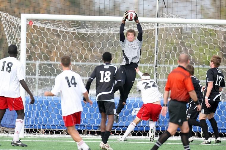 Sophomore keeper Jordan Godsey grabs a corner kick out of the air. 