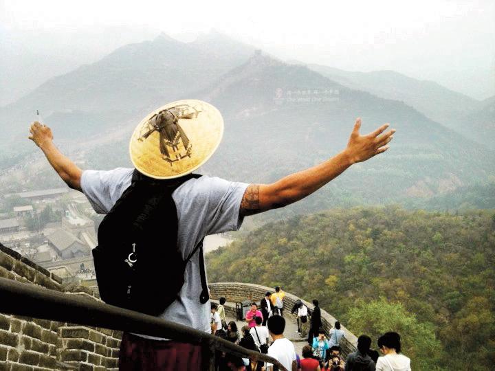 Xavier Silas stands on The Great Wall during his trip to China over the summer.