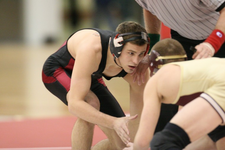 Senior Pat McLemore, pictured, defeated senior Tristen DeShazer 3-1 with a takedown in this weekends Wrestle Offs.