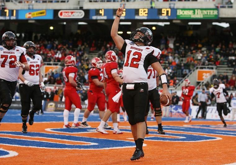 Chandler Harnish points to the sky after scoring his first rushing touchdown of the game in the first quarter of NIUs 40-17 Humanitarian Bowl victory against Fresno State. 