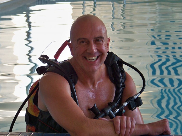 Jim Elliott, president of Diveheart, is shown in the water preparing to scuba dive in this undated photo. Diveheart is a foundation, founded in Downers Grove in 2001, which uses adaptive diving to help people with disabilities.