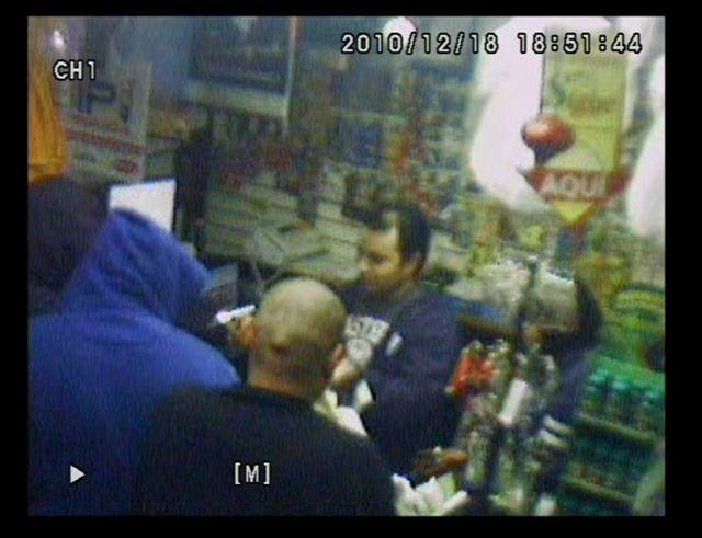 Surveillance footage captures three suspects in the alleged robbery at La Gaudalupana Money Transfr, located at 151 S. Third St.