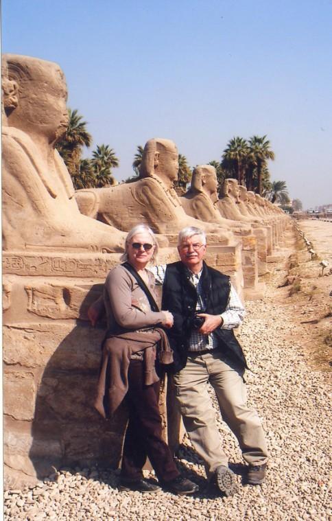 Prior to the civic unrest that halted their tour, Donna Schultz Xidis and Toney Xidis pause for a photo outside of temple of Karnak in Luxor, Egypt.