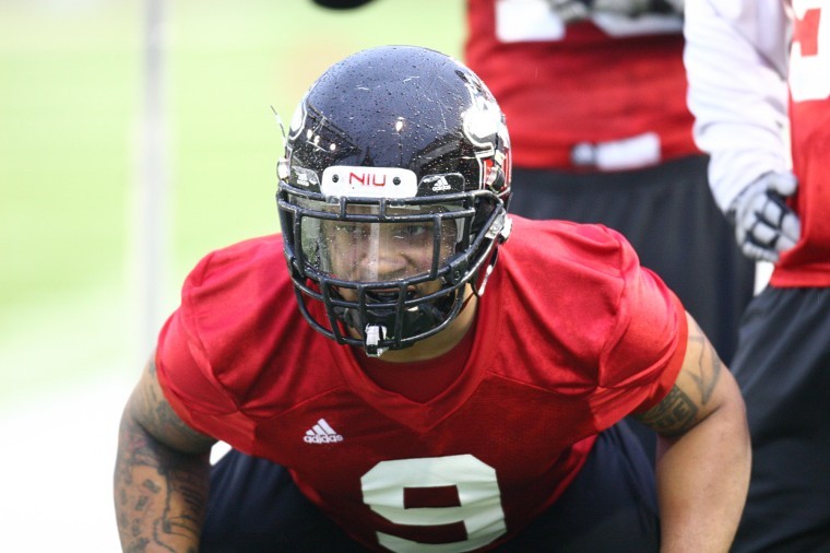 NIU linebacker Devon Butler readies himself for a drill in Tuesdays inaugural spring football practice.