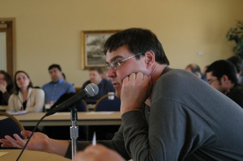 Nicole Gault | Northern Star
Christopher Nissen, a professor in the Foriegn Language department, speaks up about making student evaluations online rather then on paper at the Faculty Senate meeting Wednesday afternoon.