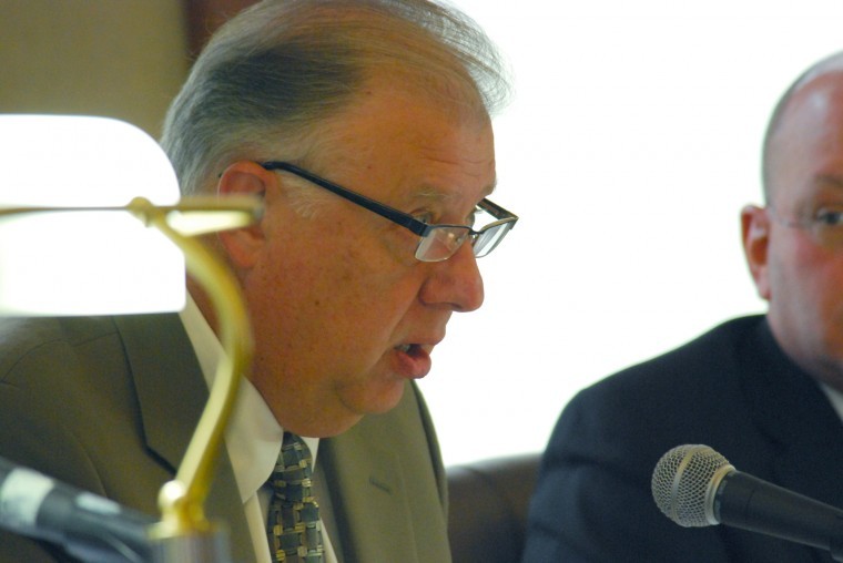 NIU President John Peters speaks at a past Board of Trustees meeting. 