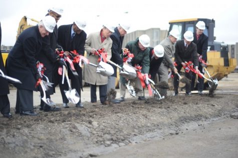 Project leaders for NIU's new residence hall break ground on site Monday afternoon, located north of Lincoln Hall. The hall is expected to be completed for the Fall 2012 semester.