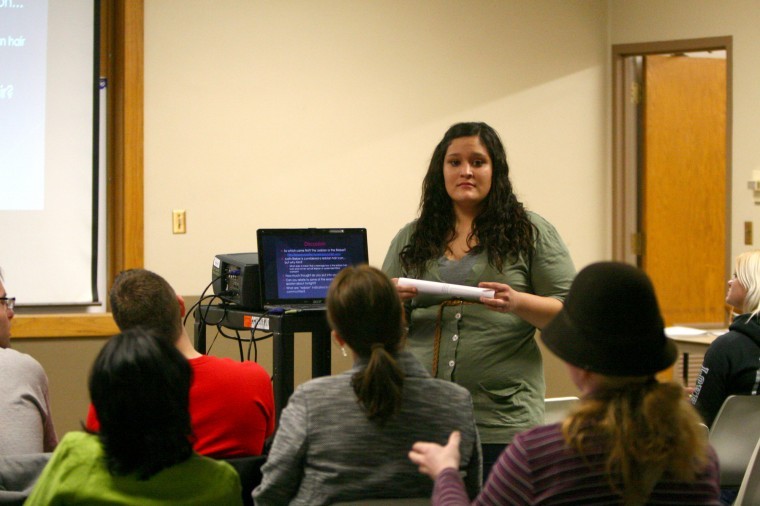 Senior womens studies major Nicole Arteaga presents part of Lesbian? Bieber? Lesbieber?!, a talk given Wednesday night in the Holmes Student Center. The event discussed the socially-concieved correlations between hairstyle and sexual orientation.