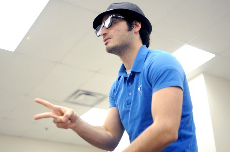 Jerry Burnes | Northern Star
Graduate student Bobby Saghafi throws down  "scissors" during a rock, paper, scissors tournament Wednesday night at the NIU Rec Center. 