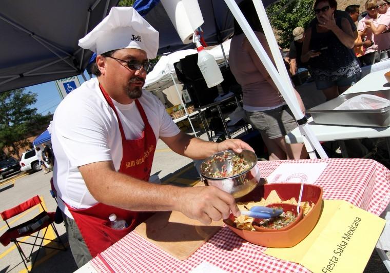 Northern Star Jeff Drust, 49, of Genoa serves his Fiesta Salsa
Mexicana salsa recipe at the Sycamore Salsa Making Contest on
Sunday.
