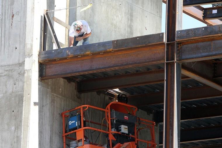 Workers continue construction on the addition to the DeKalb
County Courthouse Monday afternoon.
