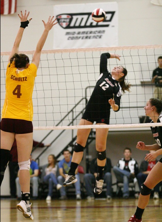 Lauren+Wicinski+jumps+to+spike+a+ball+against+Kaitlyn+Schultz+of%0ACentral+Michigan+University+at+the+game+Friday.%0A