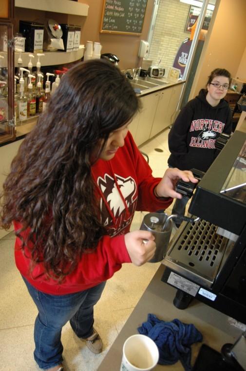 Lacey Olvera-Perez, freshman elementary education major prepares
a drink for a customer at the Coffee Corner Tuesday afternoon.
