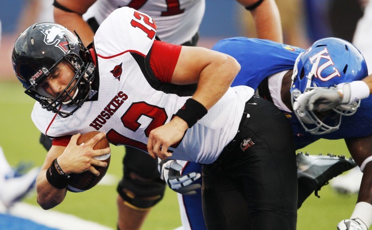 Northern Illinois quarterback Chandler Harnish gets past Kansas safety Bradley McDougald, right, for a touchdown during the first half of the college football game in Lawrence, Kan., in September 2011.
AP Photo: Orlin Wagner
