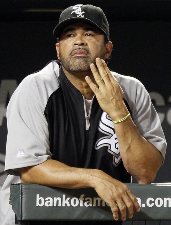 FILE - This Aug. 9, 2011 file photo shows Chicago White Sox
manager Ozzie Guillen watching during the ninth inning of a
baseball game against the Baltimore Orioles, in Baltimore.
Guillens website said hes joining the Florida Marlins, but the
post was soon taken down. The post quoted Guillen as saying he was
thrilled to join the Marlins and couldnt wait to get started. The
post went up Monday night, Sept. 26, 2011, then was removed a short
time later and replaced by a blog that discussed Guillens
departure from the Chicago White Sox while making no mention of the
Marlins. (AP Photo/Patrick Semansky, File)

