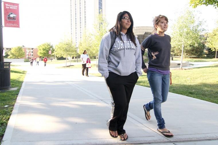 Sophomore Genesis DeLaTorre (left) walks to class with her
friend sophomore Karla Valle (right) Wednesday night in the MLK
Commons.
