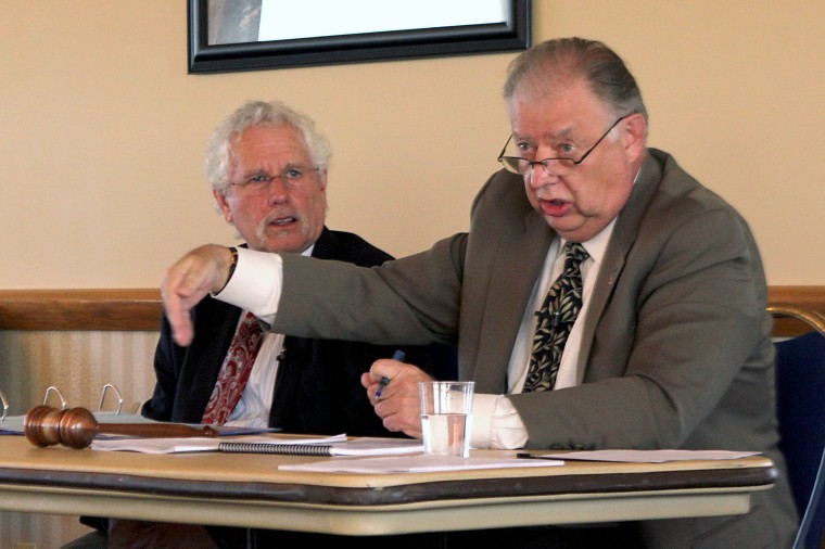 Gavin Weaver | Northern Star NIU President John Peters (right)
and executive secretary Alan Rosenbaum (left) discuss the NIU
budget Wednesday at University Council in the Sky Room of the
Holmes Student Center.
