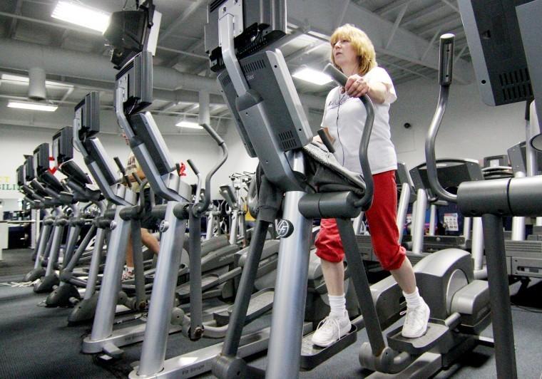 Wanda Wynes, Northern Illinois University Foundation Assistant
Controller, works her cardiovascular system on a stair stepper at
the YMCA, 2500 Bethany Road in Sycamore, Monday night.
