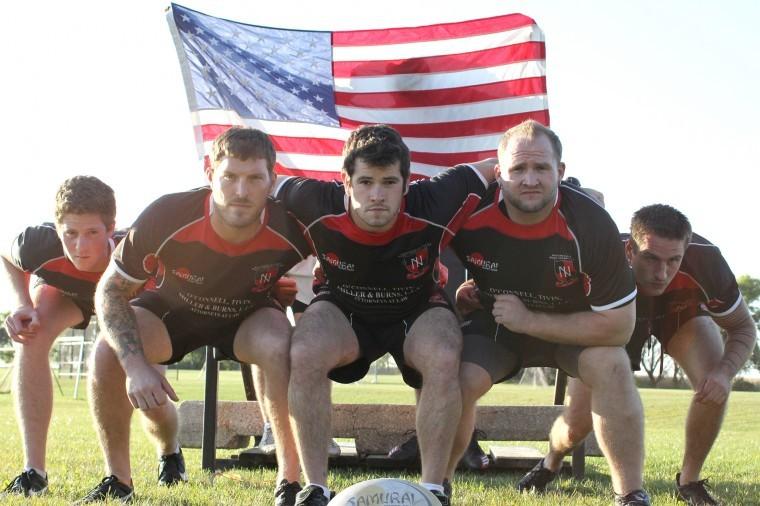 NIU rugby players from left Zach Newman, Thaddeus Hupp, James
Bennett, Ryan Dertinger and John Berg all served time in the United
States military before joining the team.
