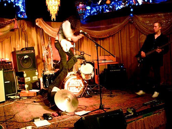 In this Oct. 11, 2010 file photo, Guitarist Hayden Halgren and
drummer Mike Finnigan trash gear as bassist Eric Jorgenson looks on
at the end of a show at The House Café.
