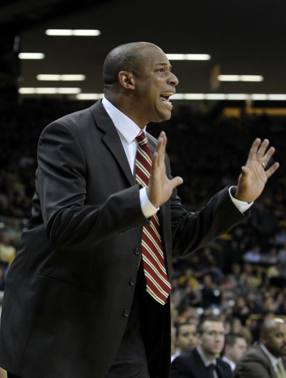 Northern Illinois head coach Mark Montgomery shouts to his team
during the first half of their NCAA college basketball game against
Iowa on Thursday, Nov. 17, 2011, in Iowa City, Iowa. (AP Photo/The
Cedar Rapids Gazette, Brian Ray) MAGS OUT
