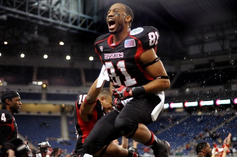 NIU wide receiver Nathan Palmer reacts to the game-winning field
goal that clinched the Huskies' first MAC Championship since 1983.
Palmer caught the game-tying touchdown in the fourth quarter and
was named the player of the game.
