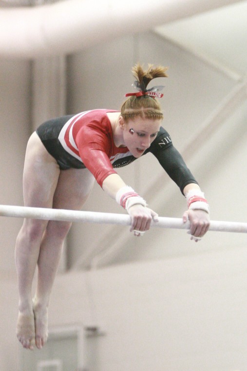 Natalie+Stutter+performs+on+the+bars+during+a+meet+against%0AWestern+Michigan+University+Sunday+at+Victor+E.+Court.%0A