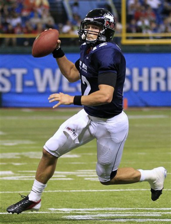 Associated Press- West quarterback Chandler Harnish, of Northern
Illinois University, runs three yards for a touchdown against the
East during the second quarter of the East-West Shrine Classic NCAA
college football game on Saturday Jan. 21, 2012, in St. Petersburg,
Fla.
