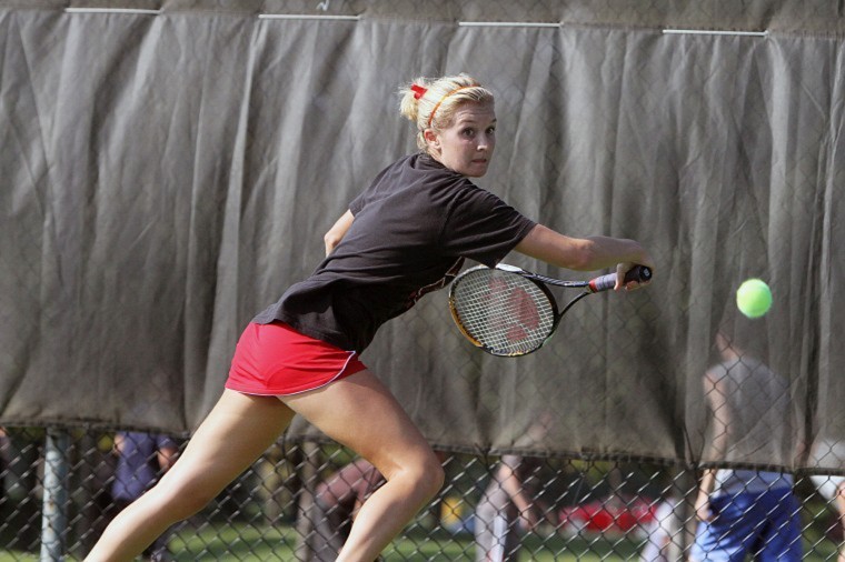 Northern Star File Photo - NIUs Sarah Mclaughlin backhands a tennis ball.
