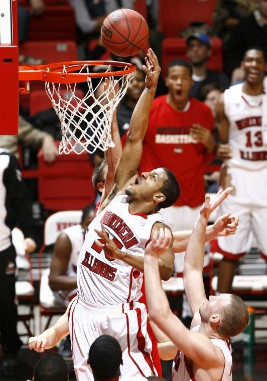 NIU Guard Tony Nixon soars for a tip in during the second half
during the game against Miami(OH) at the NIU Convocation Center on
Wednesday night.

