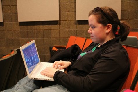 Senior marketing major Marissa Jambrone, uses her laptop
computer before class in the Jack Arends Visual Arts Building
Monday afternoon.