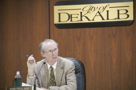 Mayor Kris Povlsen discusses the ordinance approving the redistricting of the wards of the city of DeKalb at the city council meeting Monday night. The redistricting equalizes population and attempts to raise voter turnout in some of the wards.