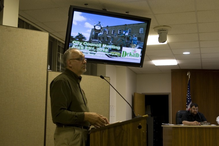 Mike Mudge, consultant for Rock River Energy Services, Co., discusses DeKalb County residents seeking third-party energy suppliers at the city council meeting Monday night.
