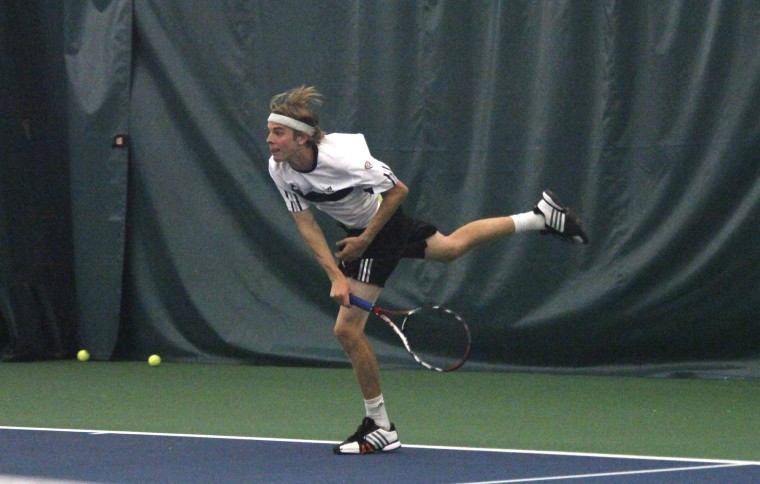 Axel Lagerlof returns a serve during a match against Buffalo Sunday at Boylan Tennis Center in Rockford.
