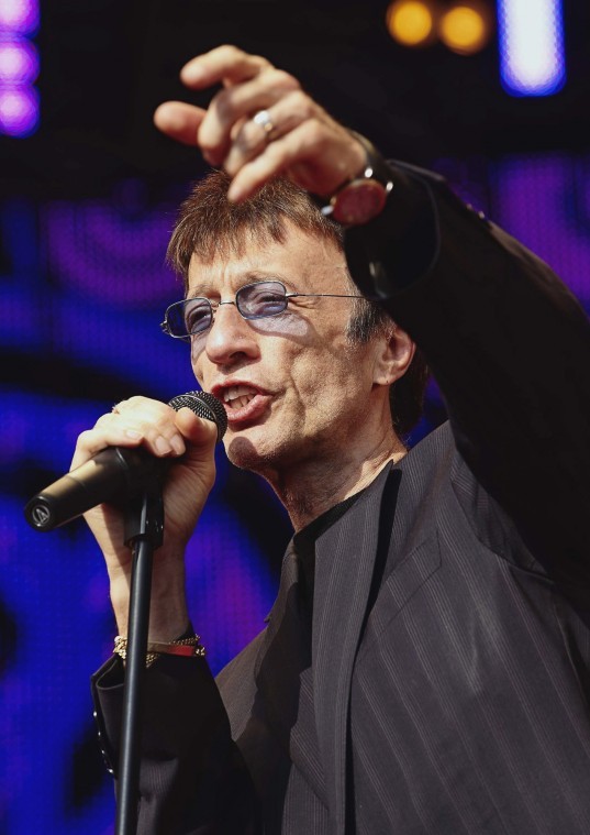 FILE This Saturday Aug. 15, 2009 file photo Britains Robin Gibb performs in the park of Ledreborg Castle near Roskilde, Denmark. (AP Photo/Polfoto,Jens Dige) 
