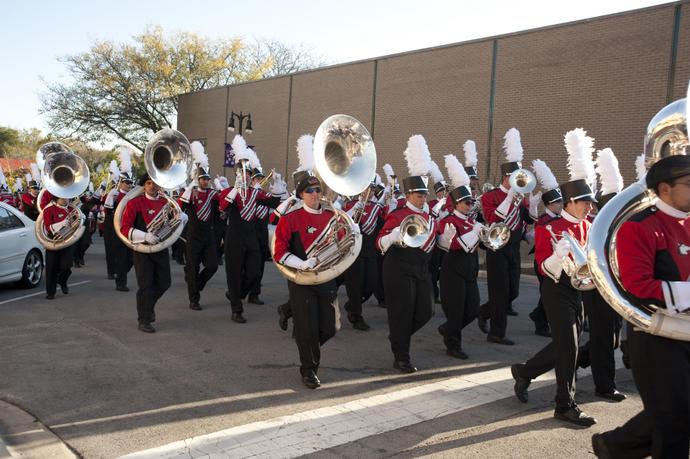 In this 2011 courtesy photo, the Huskie Marching Band performs in the Homecoming parade.
