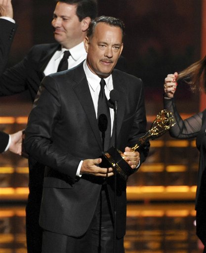 Tom Hanks accepts the award for outstanding miniseries or movie for Game Change at the 64th Primetime Emmy Awards at the Nokia Theatre on Sunday in Los Angeles.
