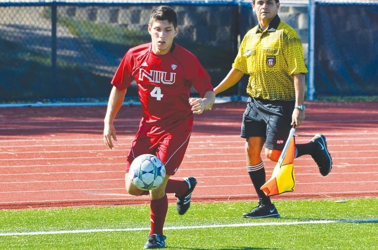 Gael Rivera (4) of NIU takes the ball down the field against Drake in a September game. Rivera scored NIUs only goal in a draw game.
