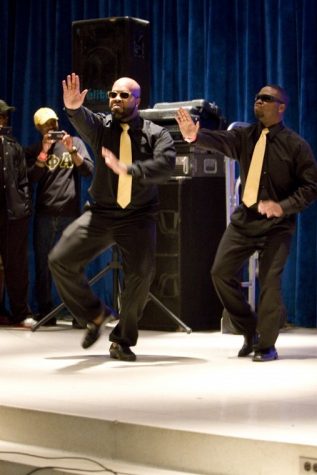 Brandon Hunter and Alandis Phillips of Alpha Phi Alpha fraternity Inc. strolling at the stroll competition in the Carl Sandburg Auditorium hosted by the women of Sigma Gamma Rho sorority Inc. The winners of the stroll competition were the women of Zeta Phi Beta Sorority Inc. and the men of Alpha Phi Alpha Fraternity Inc.