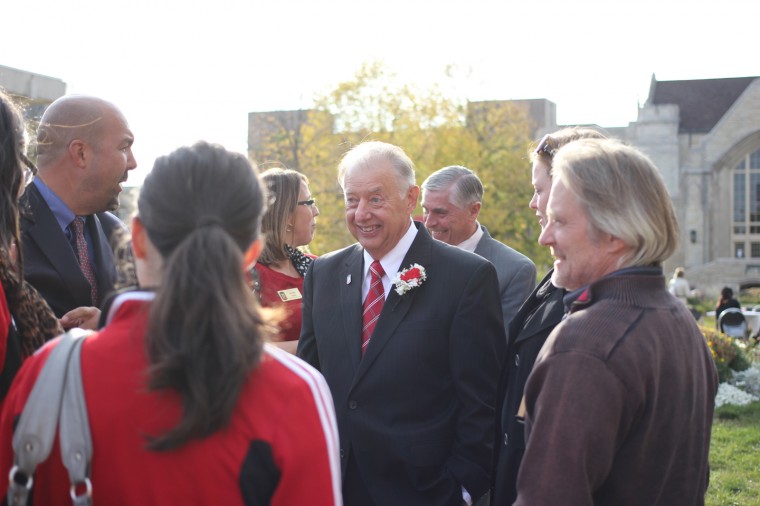 NIU President John G. Peters greets people after his State of the University Speech in front of Altgeld Hall Thursday afternoon.
