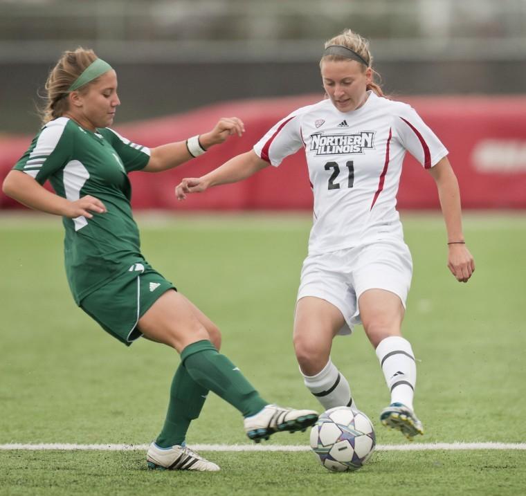Samantha Hill forward/defender for Northern Illinois University takes the ball away from an Eastern Michigan player September 21, 2012.
