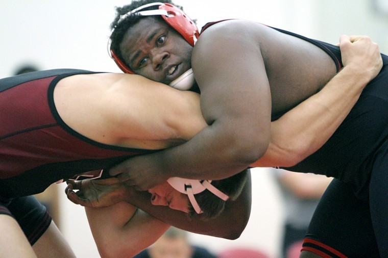 NIUs Jared Torrence concentrates on keeping hold of a Stanford wrestler.
