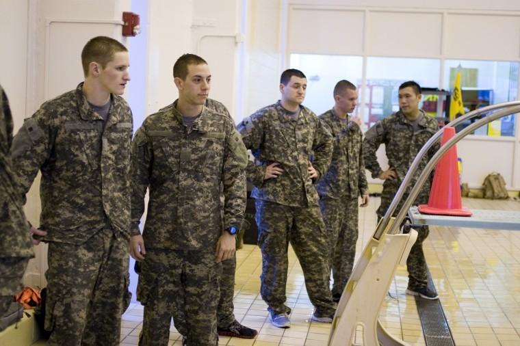 Members of ROTC wait in line to participate in a event at the Combat Water Survival Test.
