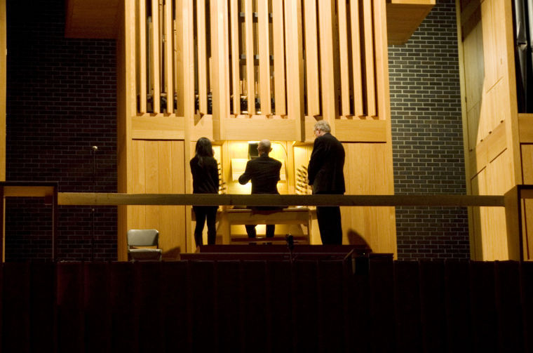 Guest musician David Schrader performs a musical piece during his organ recital at the Boutell Memorial Concert Hall on Sunday afternoon.
