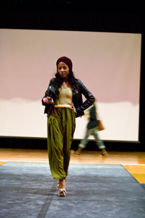 Shakira Bates, Northern Illinois University alumni, walks the runway in the Afro-centric Fashion Show hosted by PPMO modeling organization in the Holmes Student Center on Thursay night.
