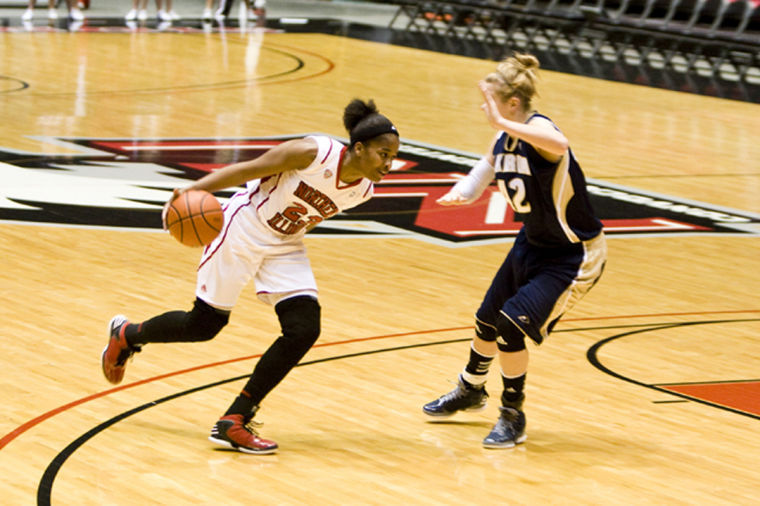 Sophomore forward Jada Buggs attacks the basket during the Huskies game against the Akron Zips.
